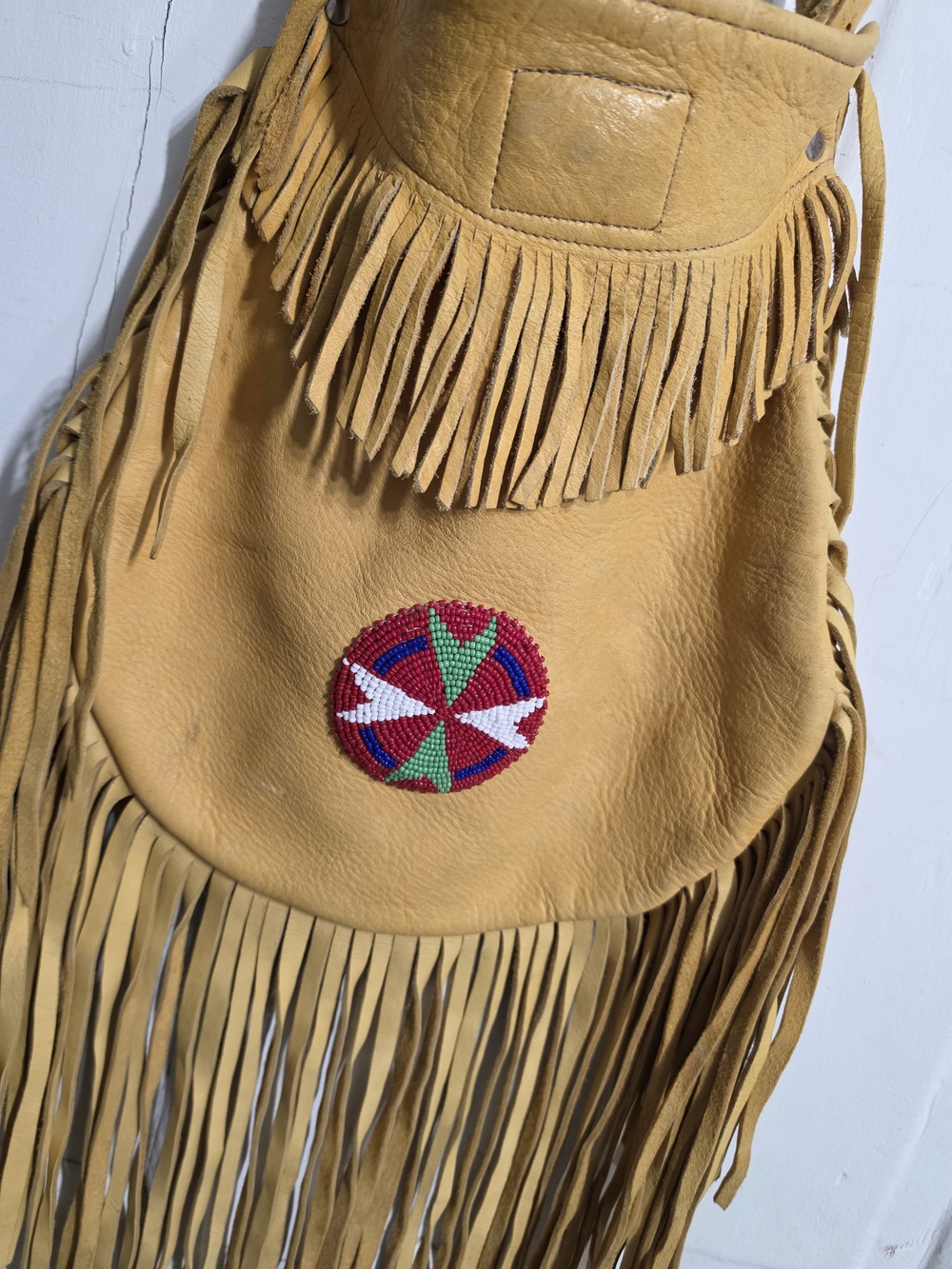 Vintage Fringed Leather Shoulder Bag with Beaded Medallion. Navajo Made